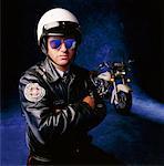 Portrait of Male Police Officer With Motorcycle