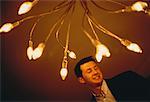 Man and Light Bulbs
