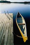Canoe Tied to Dock on Chandos Lake, Kawartha Region, Ontario Canada
