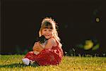 Portrait of Girl with Puppy Outdoors