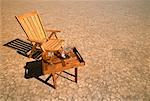 Deck Chair and Table with Glass Of Water in Desert Nevada, USA