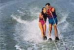 Couple Waterskiing in Swimwear