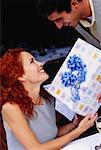 Man Giving Gift to Woman