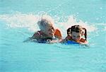 Grandmother and Granddaughter Swimming