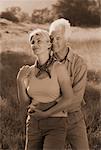 Portrait of Mature Couple Standing in Field
