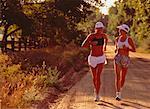 Women Running Along Road Boulder, Colorado, USA