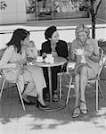 Women Talking at Outdoor Cafe