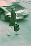 Blurred View of Businesswoman Walking on Street