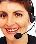 Portrait of Mature Woman Wearing Telephone Headset, Smiling