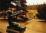 Statue of Woman near Building Budapest, Hungary