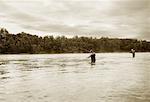 Two Men Fly Fishing Kennebec River, Maine, USA