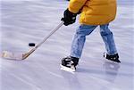 Back View of Boy Playing Hockey