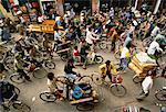 Overhead View of People Riding Bikes on Street, Hanoi, Vietnam