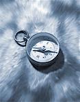 Compass on Blurred Stone Surface