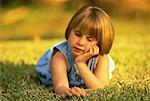 Portrait of Girl Lying in Grass