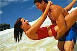 Couple in Swimwear, Embracing on Beach Dominican Republic, Caribbean