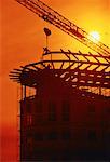 Silhouette of Building Construction and Crane at Sunset Calgary, Alberta, Canada