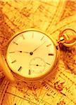 Pocket Watch on Antique Map