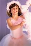 Portrait of Girl Wearing Ballerina Costume and Pink Boa