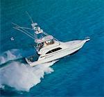 Aerial View of Boat Speeding on Water, Bahamas