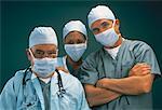 Portrait of Three Surgeons Wearing Surgical Masks