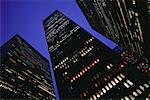 Looking Up at Office Towers at Night, New York, New York, USA