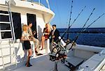 Zwei Paare in formalen tragen auf Boot, Florida Keys, Florida, USA