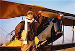 Portrait of Pilot with Tiger Moth Airplane