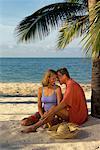 Mature Couple on Beach, Face to Face, Smiling