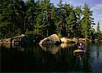 Man Kayaking Belgrade Lakes, Maine, USA
