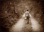 Back View of Boy with Fishing Rod On Path, Belgrade Lakes, ME, USA