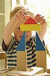 Boy Building Tower from Building Blocks
