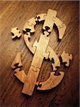 Wooden Jigsaw Puzzle Forming Dollar Sign