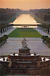 Overview of Courtyard with Statues and Fountain at Sunset Versailles, France