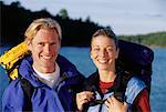 Portrait of Couple with Hiking Gear near Lake Haliburton, Ontario, Canada