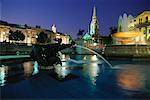 Fountain in Trafalgar Square At Dusk, London, England