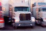 Blurred Transport Trucks