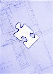 Jigsaw Puzzle Piece on Blueprints