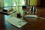 Quill Pen, Eyeglasses, Paper and Books on Antique Desk in Ralph Waldo Emerson House Concord, Massachusetts, USA