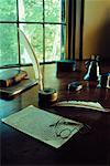 Quill Pen, Eyeglasses, Paper and Books on Antique Desk in Ralph Waldo Emerson House Concord, Massachusetts, USA