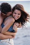 Couple Embracing on Beach