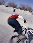 Blurred Back View of BMX Biker At Skatepark Toronto, Ontario, Canada