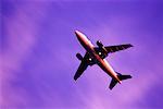 Looking Up at Plane in Sky, Toronto, Ontario, Canada