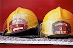 Close-Up of Firefighter Helmets On Fire Truck