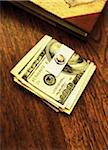 American Currency in Money Clip With Globe