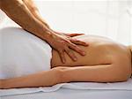 Woman Having Back Massaged