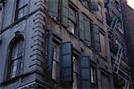 Building with Shuttered Windows And Fire Escapes, Cortlandt Alley Tribeca, New York, USA