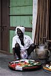 Portrait of Cake Seller in Shop On Five Foot Way Penang, Malaysia