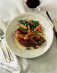 Close-Up of Meal with Grouse and Vegetables