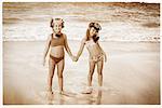 Portrait of Two Girls in Swimwear On Beach, Wearing Snorkel and Goggles